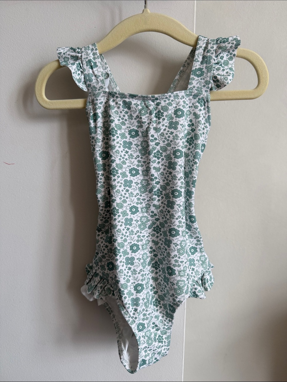 Girls Floral Ruffle One-Piece Swimsuit in Green and White. European brand